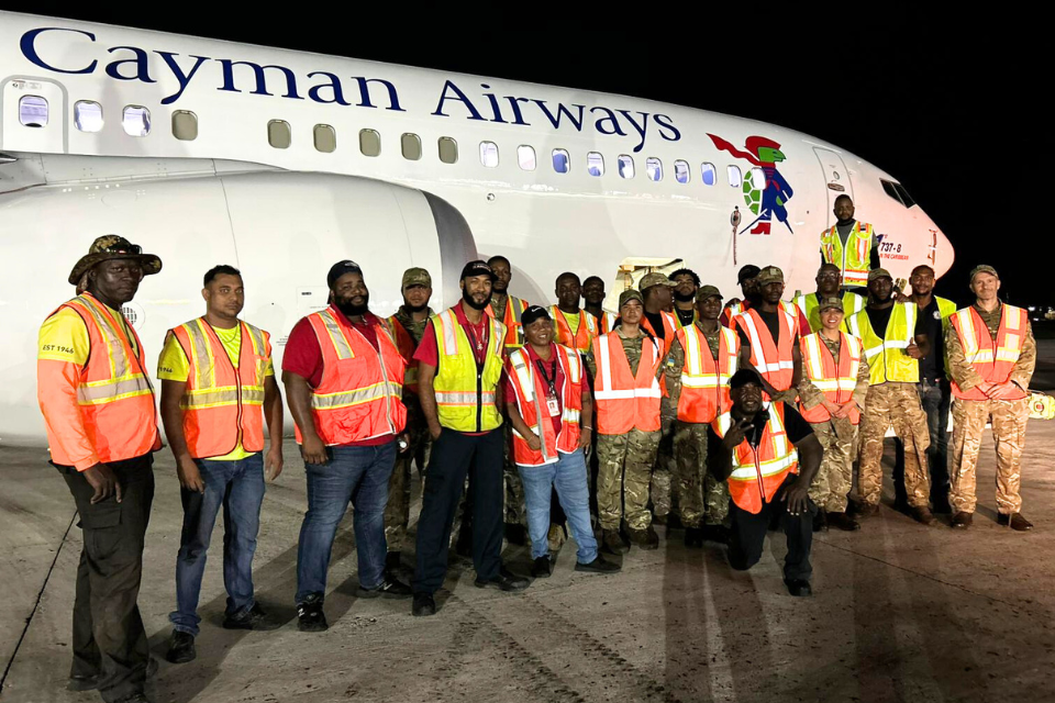 Sharing a light moment after the cargo is loaded.