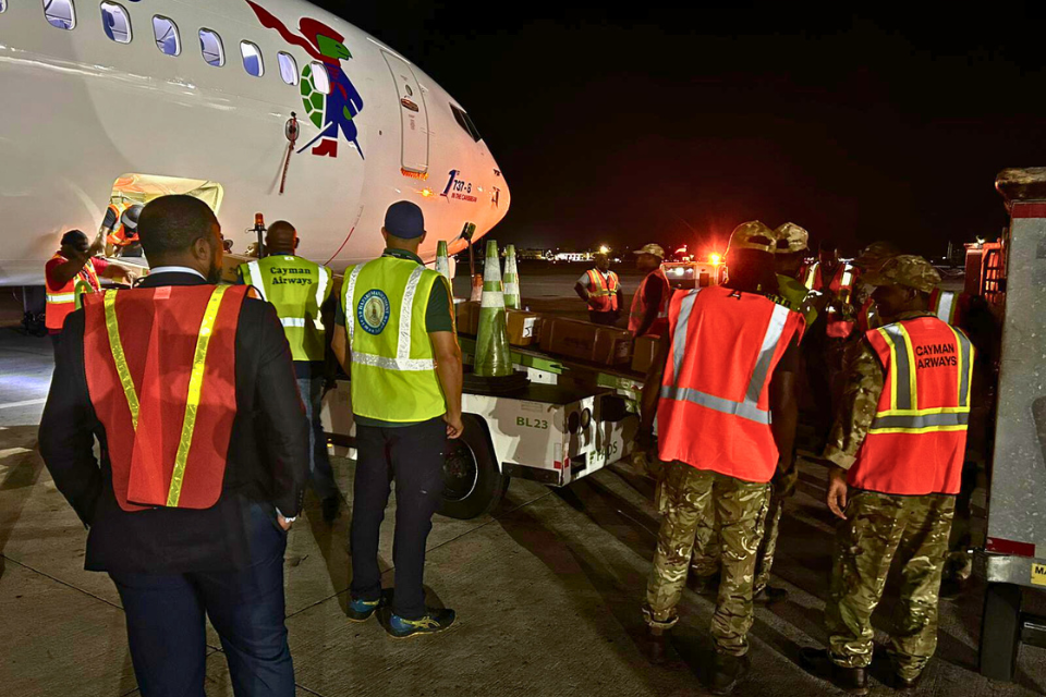 Working together to ensure the supplies are loaded.